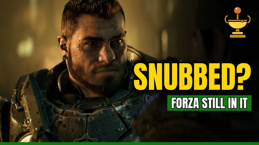 Gears of War: E-Day soldier in armor with SNUBBED? text, a golden joystick trophy and a FORZA STILL IN IT banner